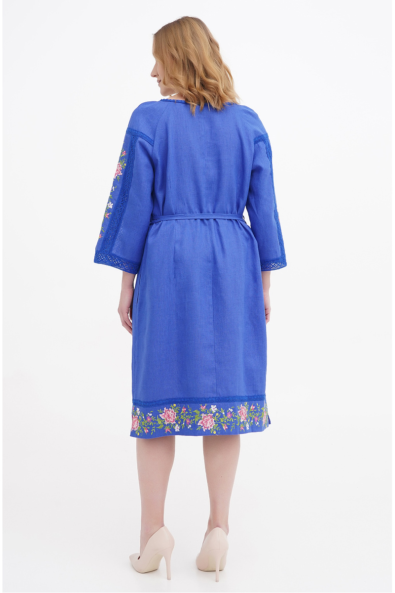 Blue dress embroidered with Orzhitsa.